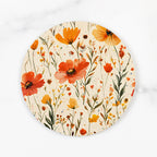 Round ceramic plate with floral design on a white background
