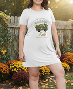Woman wearing a white dress with a graphic design outdoors