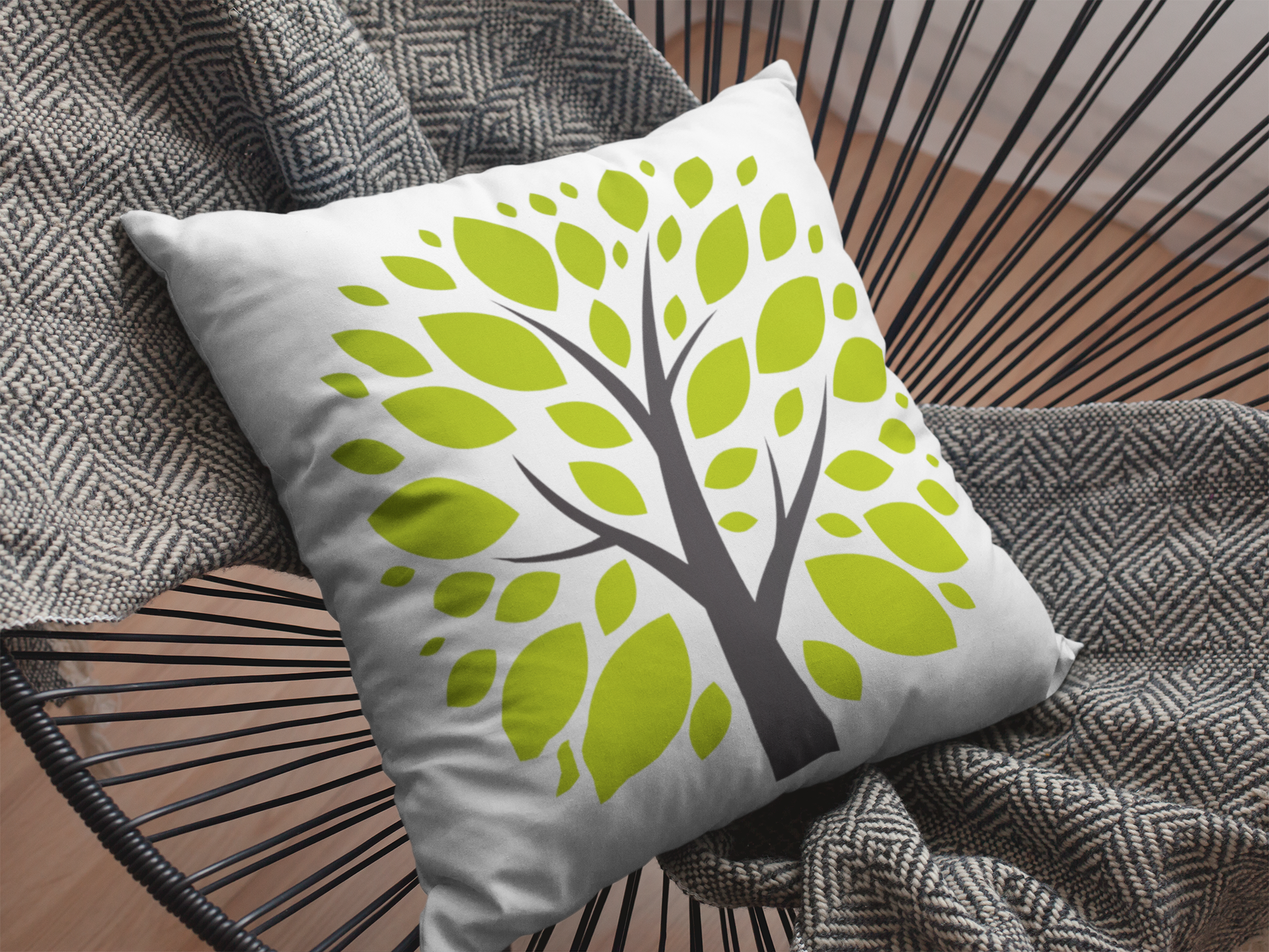 Decorative pillow with a tree design on a textured surface
