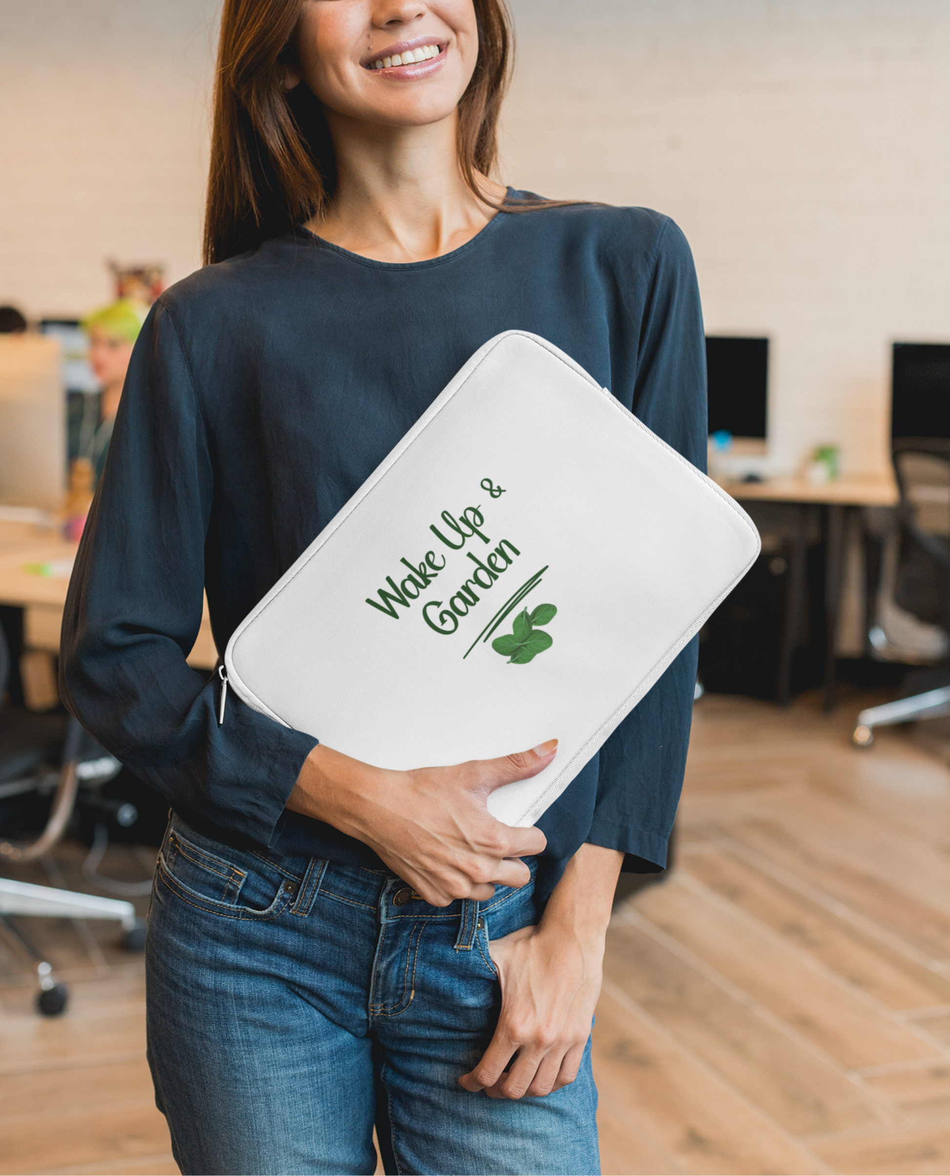 Woman holding a white folder with text and a logo in an office setting