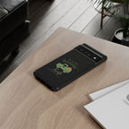 Phone case with a green design on a wooden table