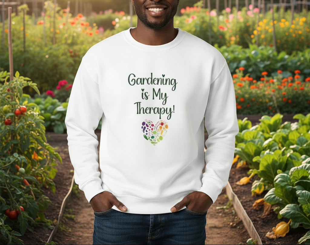 White sweatshirt with 'Gardening is My Therapy' text and heart design on a beige background