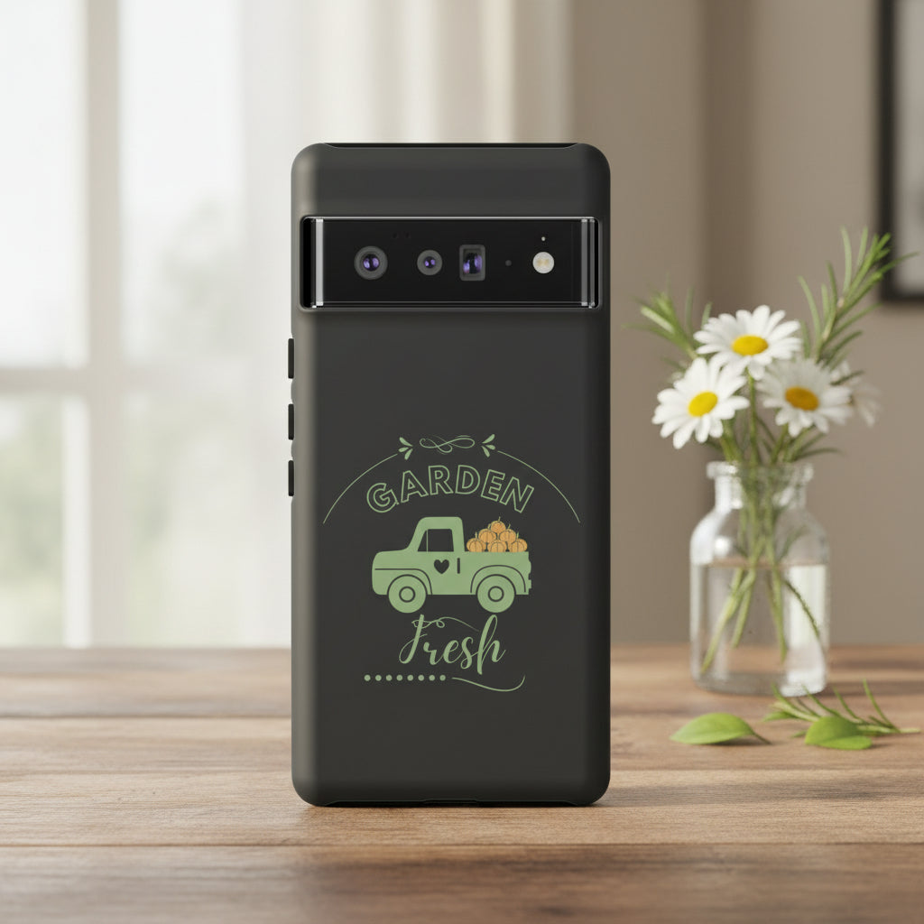 Black phone case with a green truck and 'Garden Fresh' text design