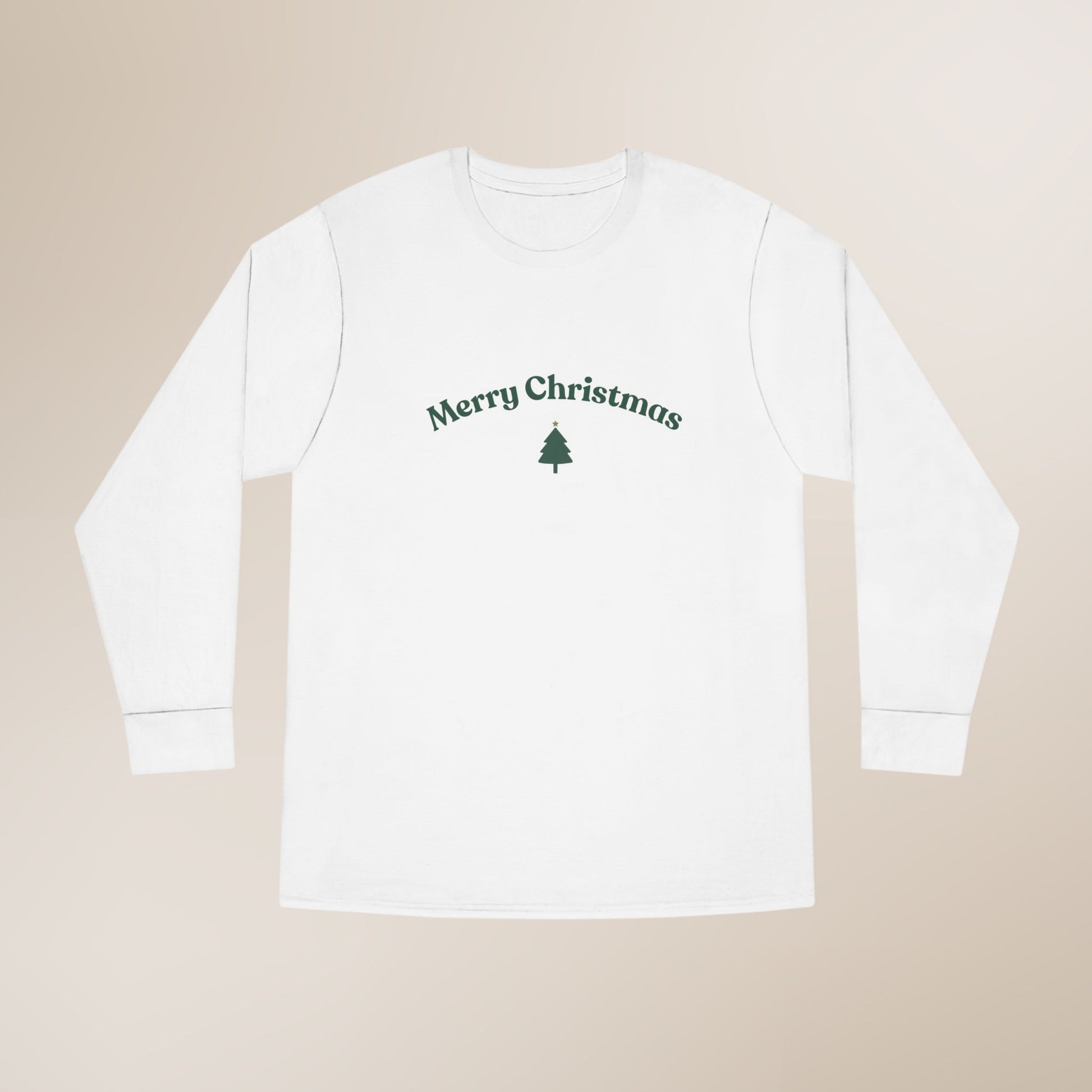 White long-sleeve shirt with 'Merry Christmas' and a tree design on a beige background