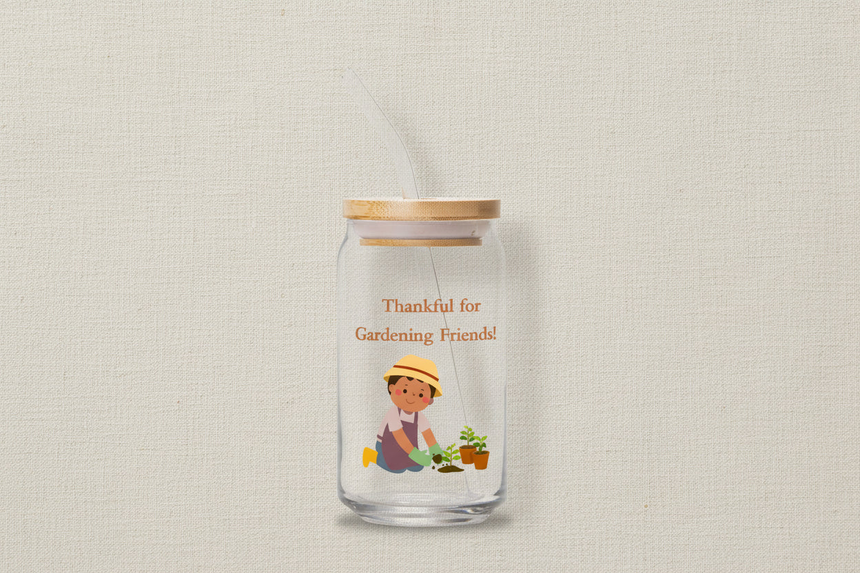 Glass tumbler with a bamboo lid featuring an illustration of a person gardening and text on a white background.