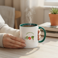 Person holding a mug with steam, sitting in a cozy room with a plant and books.