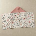Floral-patterned envelope with a pink interior on a white background