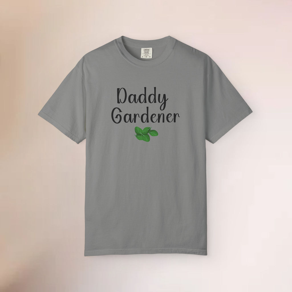 Gray t-shirt with 'Daddy Gardener' text and green leaf graphic on a gradient background