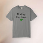 Gray t-shirt with 'Daddy Gardener' text and green leaf graphic on a gradient background
