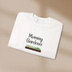 White sweatshirt with 'Mommy Gardener' text and garden graphic on a beige background