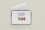 Laptop sleeve with cartoon vegetables and 'Gardening is My Time to Shine' text on a white background