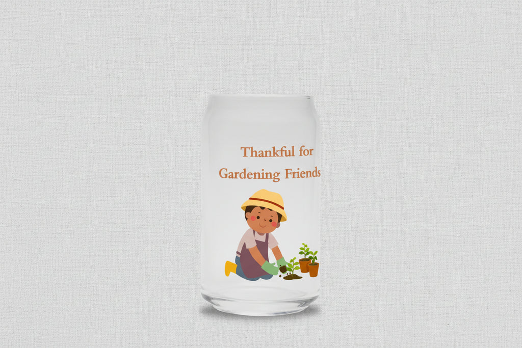 Glass tumbler with a illustration of a person gardening and text 'Thankful for Gardening Friends' on a white background