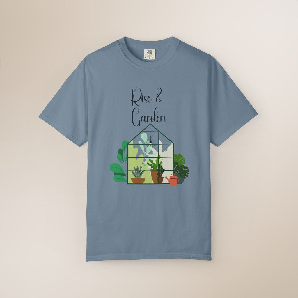 Blue t-shirt with 'Rise & Garden' design on a beige background