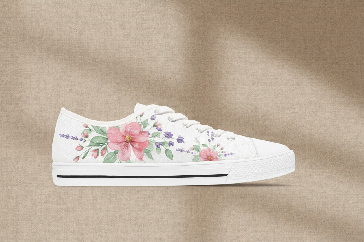 White sneaker with floral design on a beige background