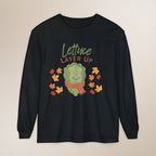 Black long-sleeve shirt with a cartoon lettuce character and 'Lettuce Layer Up' text on a beige background