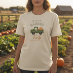 Person wearing a t-shirt with a garden graphic in an outdoor setting