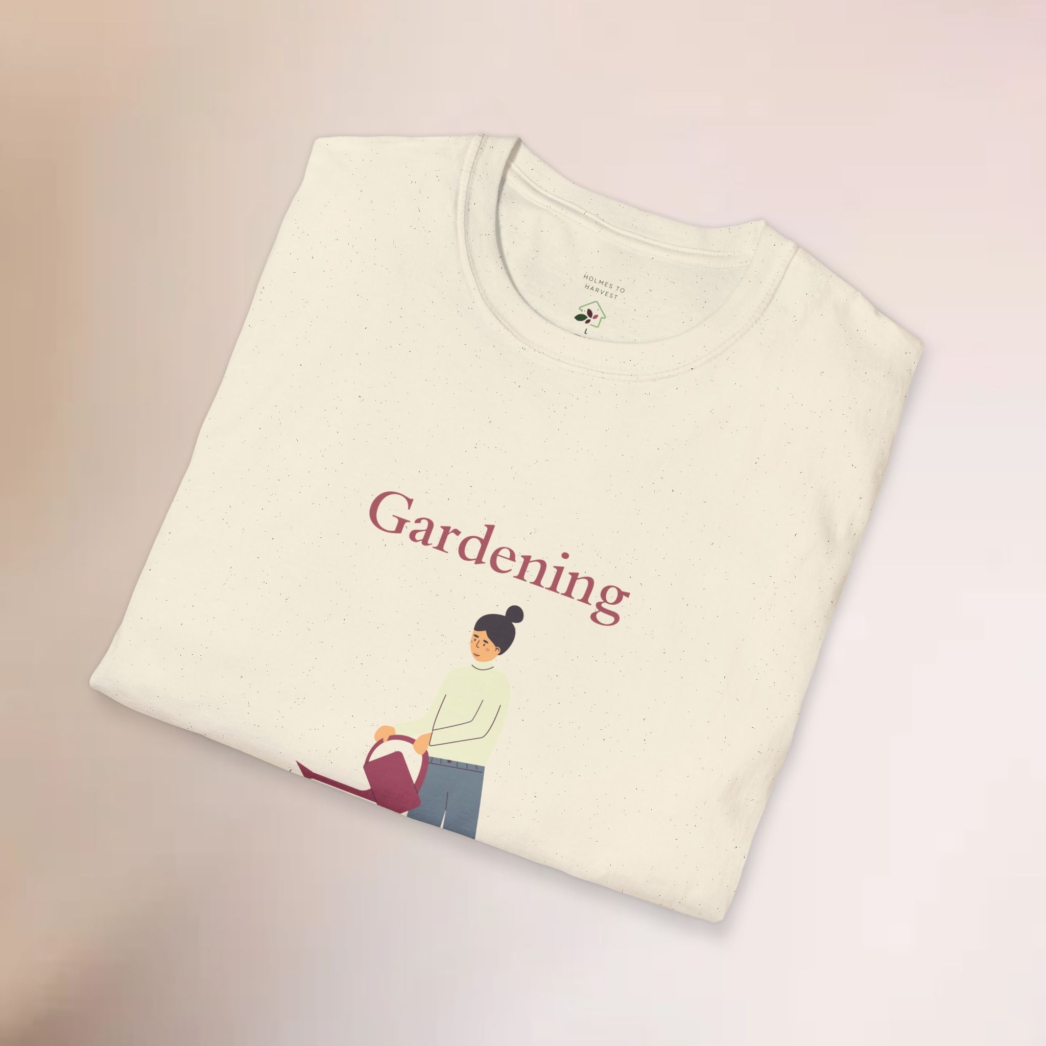 Folded t-shirt with 'Gardening' text and graphic on a light background