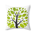 Decorative pillow with a tree design featuring green leaves and a black trunk on a white background.