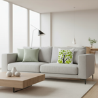 Modern living room with a gray sofa and decorative pillows.