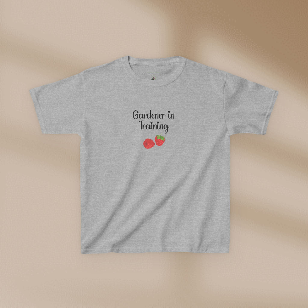 Gray t-shirt with 'Gardener in Training' text and strawberry graphics on a beige background