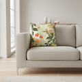 Beige sofa with a floral pillow in a bright room