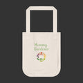 Beige tote bag with 'Mommy Gardener' text and floral design on a white background
