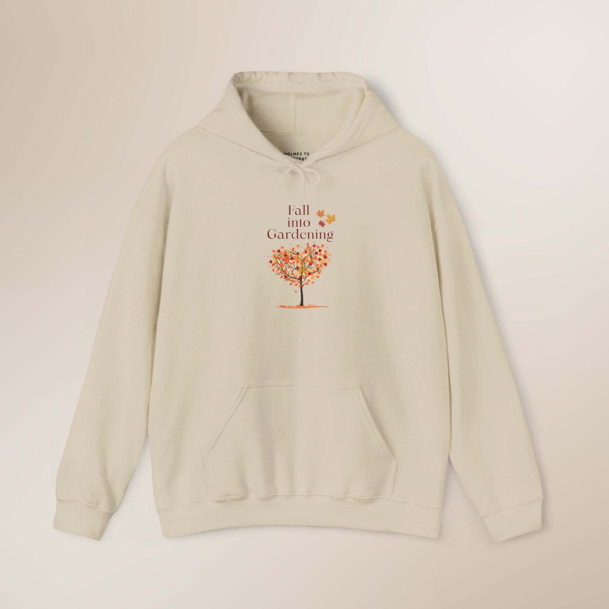 Beige hoodie with a tree graphic and text on a beige background