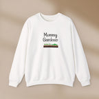 White sweatshirt with 'Mommy Gardener' text and graphic on a beige background