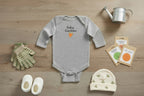 Gray baby onesie with 'Baby Gardener' text and carrot graphic on a white background