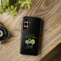 Black phone case with 'Garden Fresh' design on a wooden surface