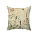 Decorative pillow with floral and butterfly pattern on a beige background
