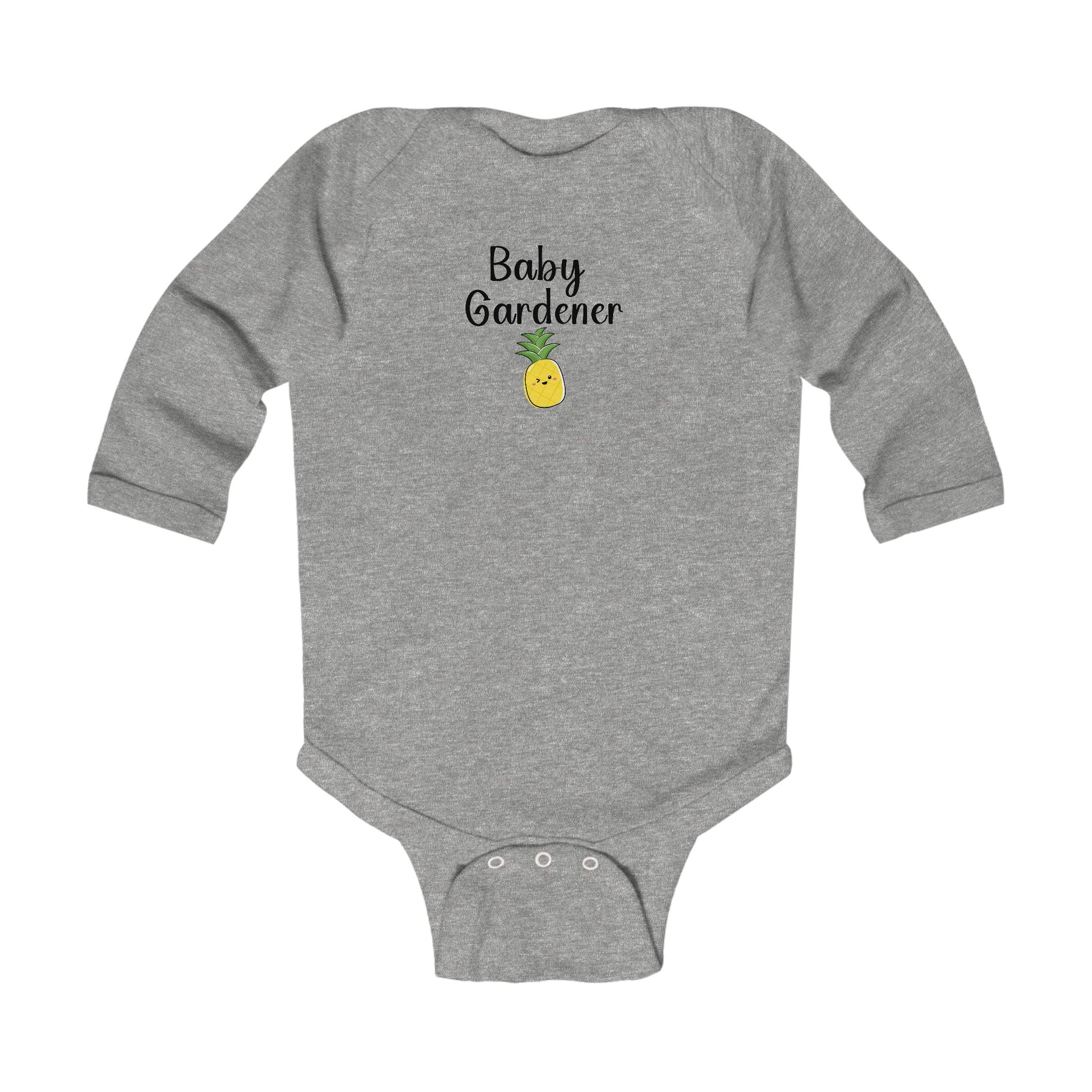 Gray baby onesie with 'Baby Gardener' and a pineapple graphic on a white background