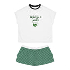 White t-shirt with 'Wake Up & Garden' text and green shorts on a white background