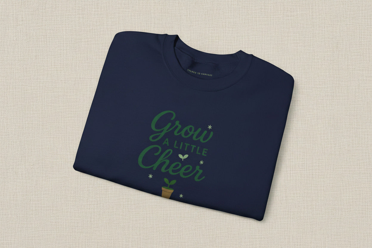 Folded black sweatshirt with 'Perfectly Imperfect' text on a white background