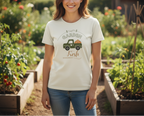 Woman wearing a 'Garden Fresh' t-shirt in a garden setting