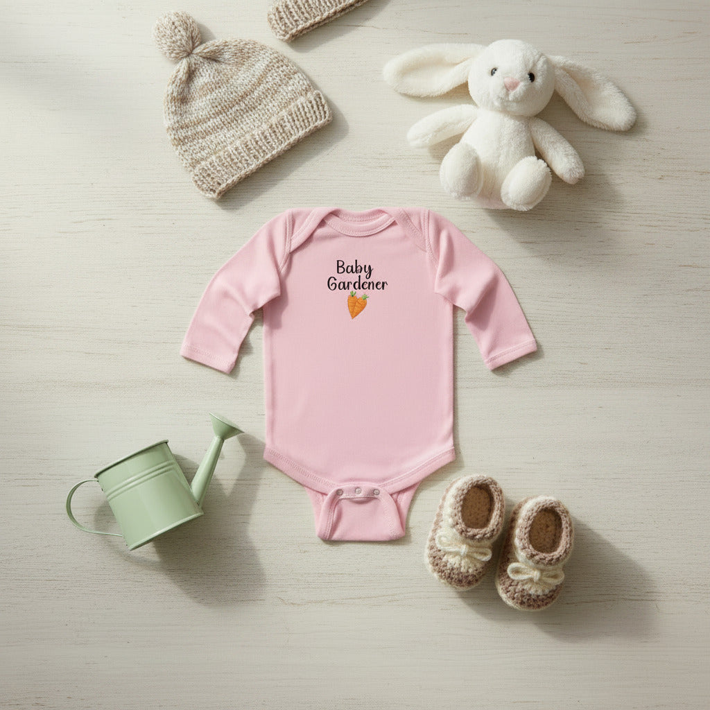 Pink baby onesie with 'Baby Gardener' text and carrot graphic on a white background