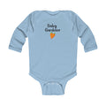 Light blue baby onesie with 'Baby Gardener' text and carrot graphic on a white background
