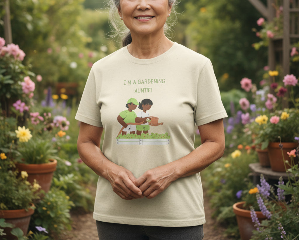 T-shirt with graphic of two people gardening and text 'I'm a gardening auntie!' on a beige background