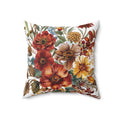 Floral-patterned pillow with autumn colors on a white background
