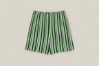 Green and white striped shorts on a light gray background