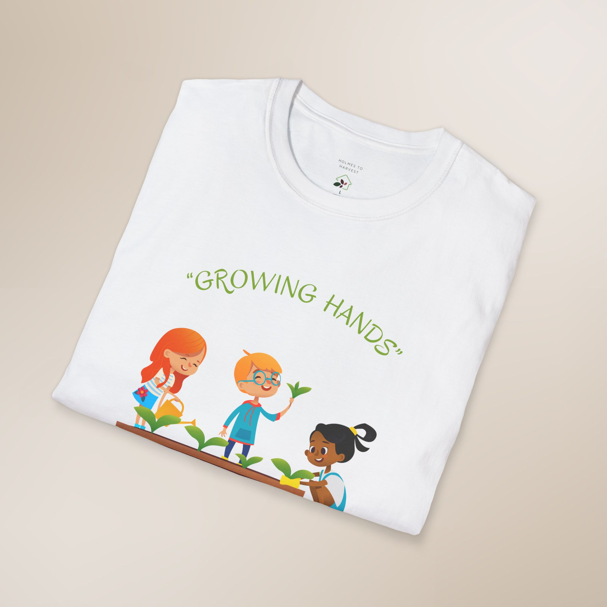 White t-shirt with 'Growing Hands' graphic on a beige background