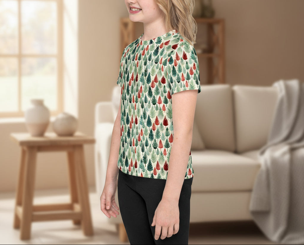 Young girl wearing a patterned shirt in a living room setting