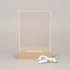 Wooden block with a white cable on a white background