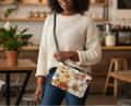 Woman holding a floral handbag in a casual setting