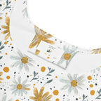Floral patterned fabric with yellow and white flowers on a white background