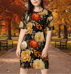 Woman wearing a floral dress with orange and yellow flowers on a white background