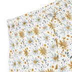Floral patterned fabric with yellow flowers on a white background