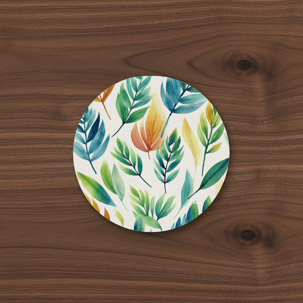 Round coaster with colorful leaf pattern on a white background