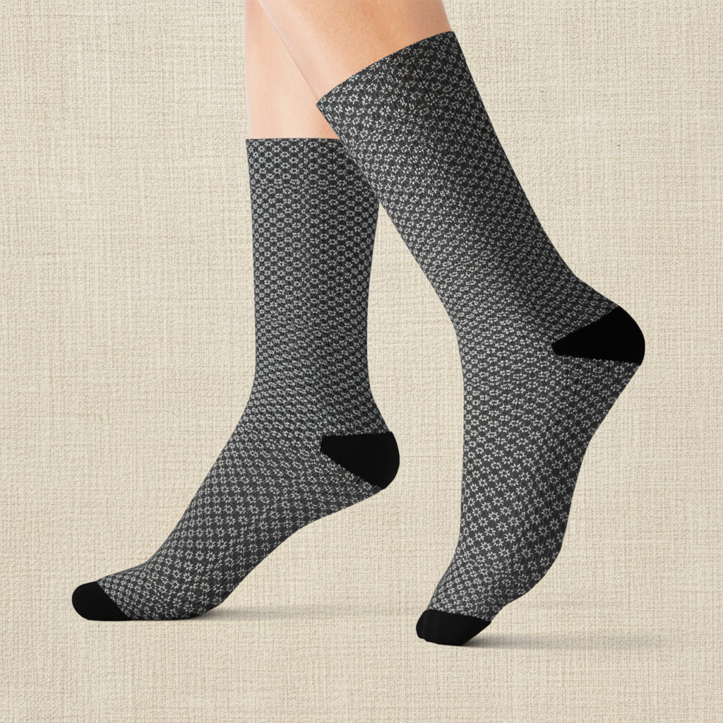 Patterned socks worn by a person on a white background