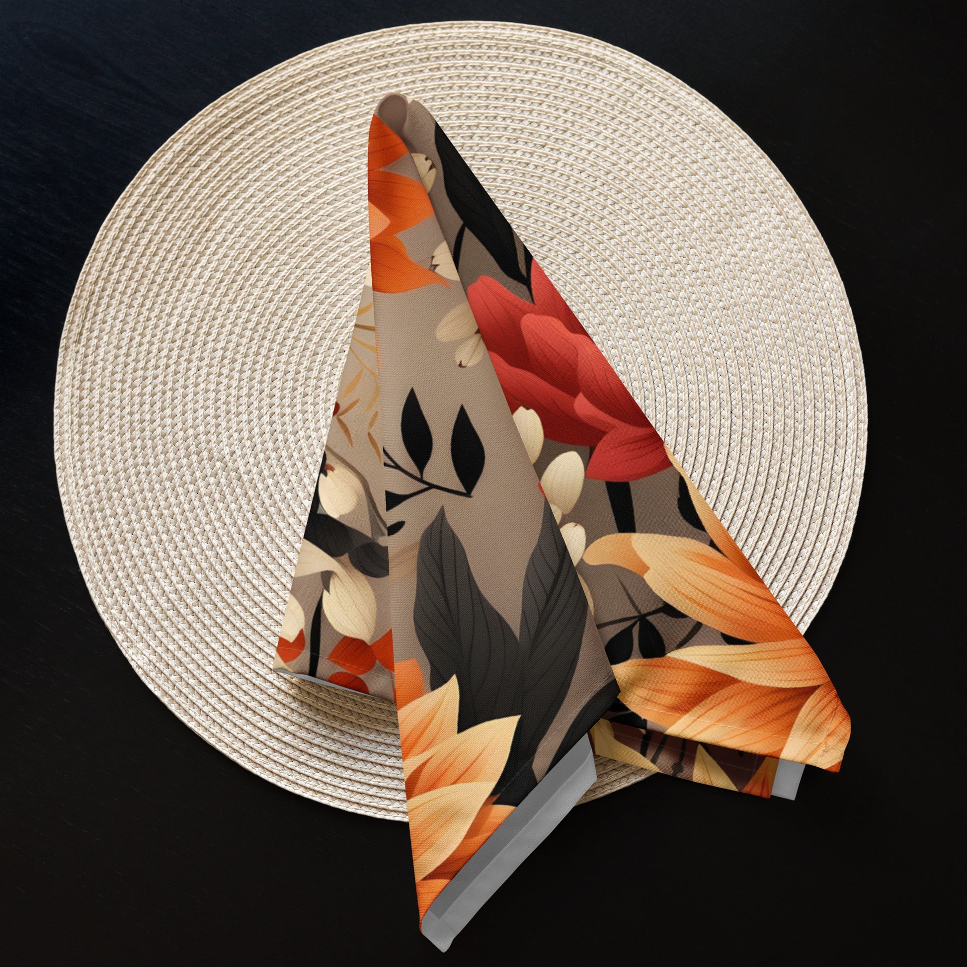 Decorative folded fabric with autumnal pattern on a textured white surface